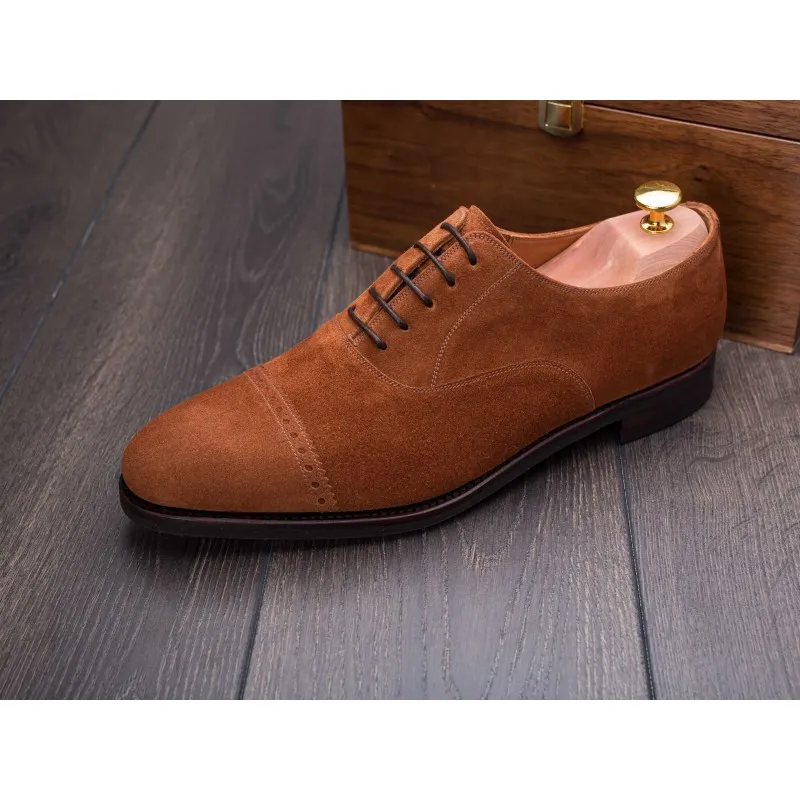 Skolyx brogued cap toe oxford polo suede